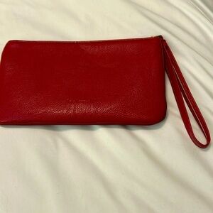 Red leather wristlet.